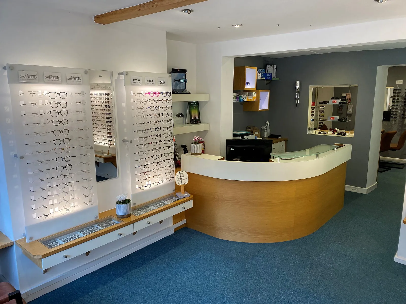 Interior view of the shop's eyewear display wall