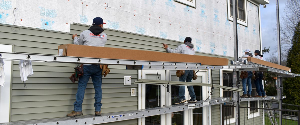 Professional siding installation on a residential home