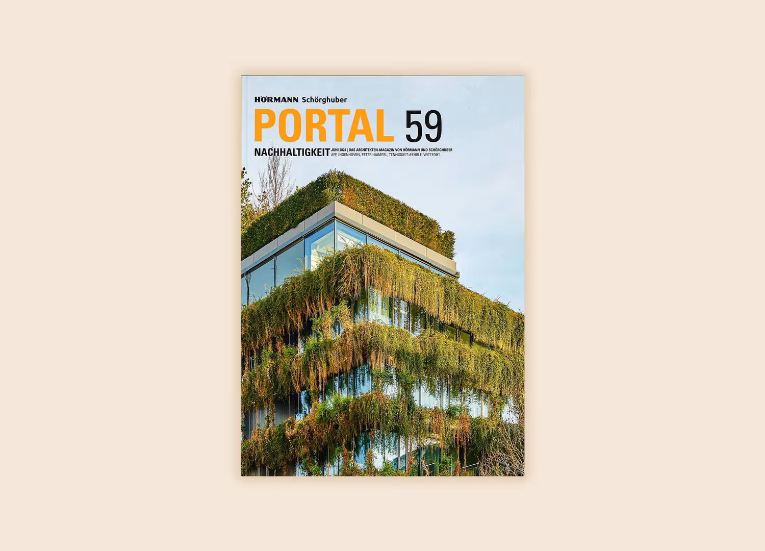 Magazine cover showing a modern building covered in cascading green plants and glass windows.