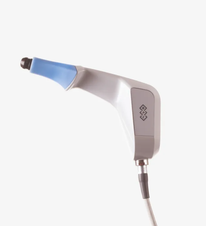 White and gray handheld device with a blue tip connected to a cable on a white background.