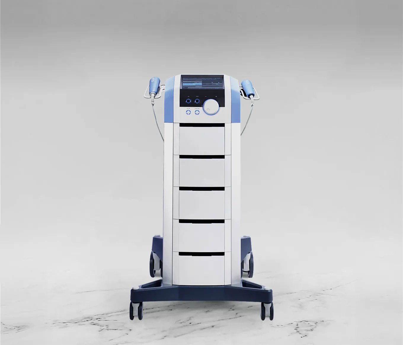 Medical device with control panel, two handheld tools, and storage drawers on wheels.