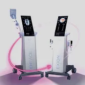 Two modern medical or cosmetic devices on wheels with glowing screens and pink tubing.