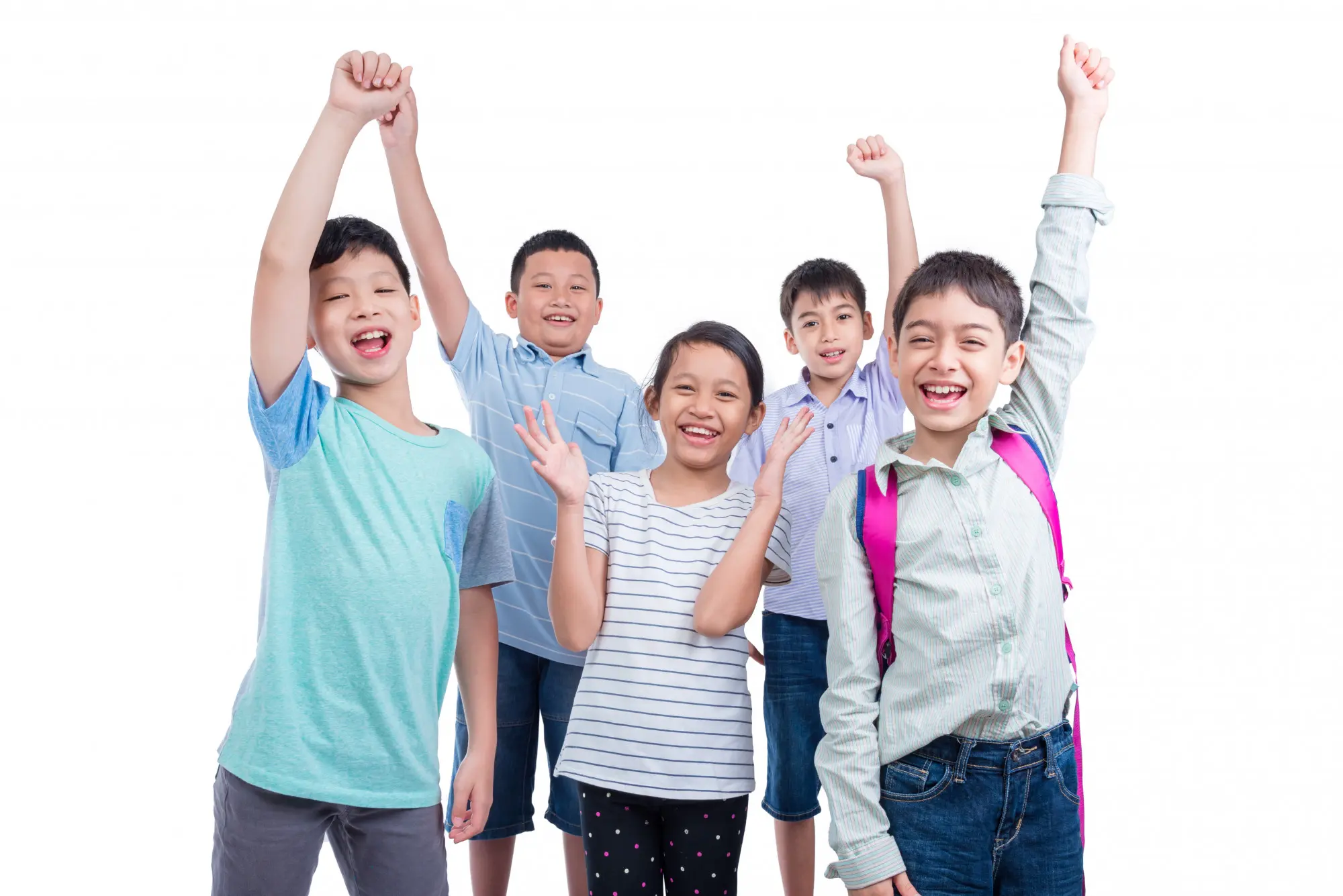 Five happy Asian children cheering with arms raised in celebration at SuperMinds Singapore.