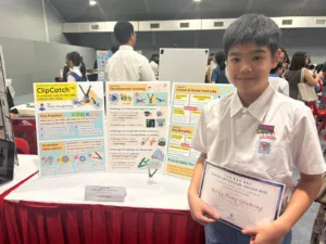 Ricky presenting ClipCatch at the Tan Kah Kee Young Inventors Award 2025