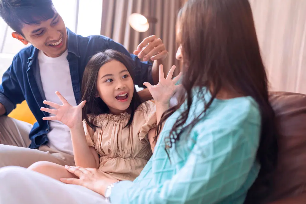 Parent and child having a meaningful conversation at home to develop storytelling and communication skills