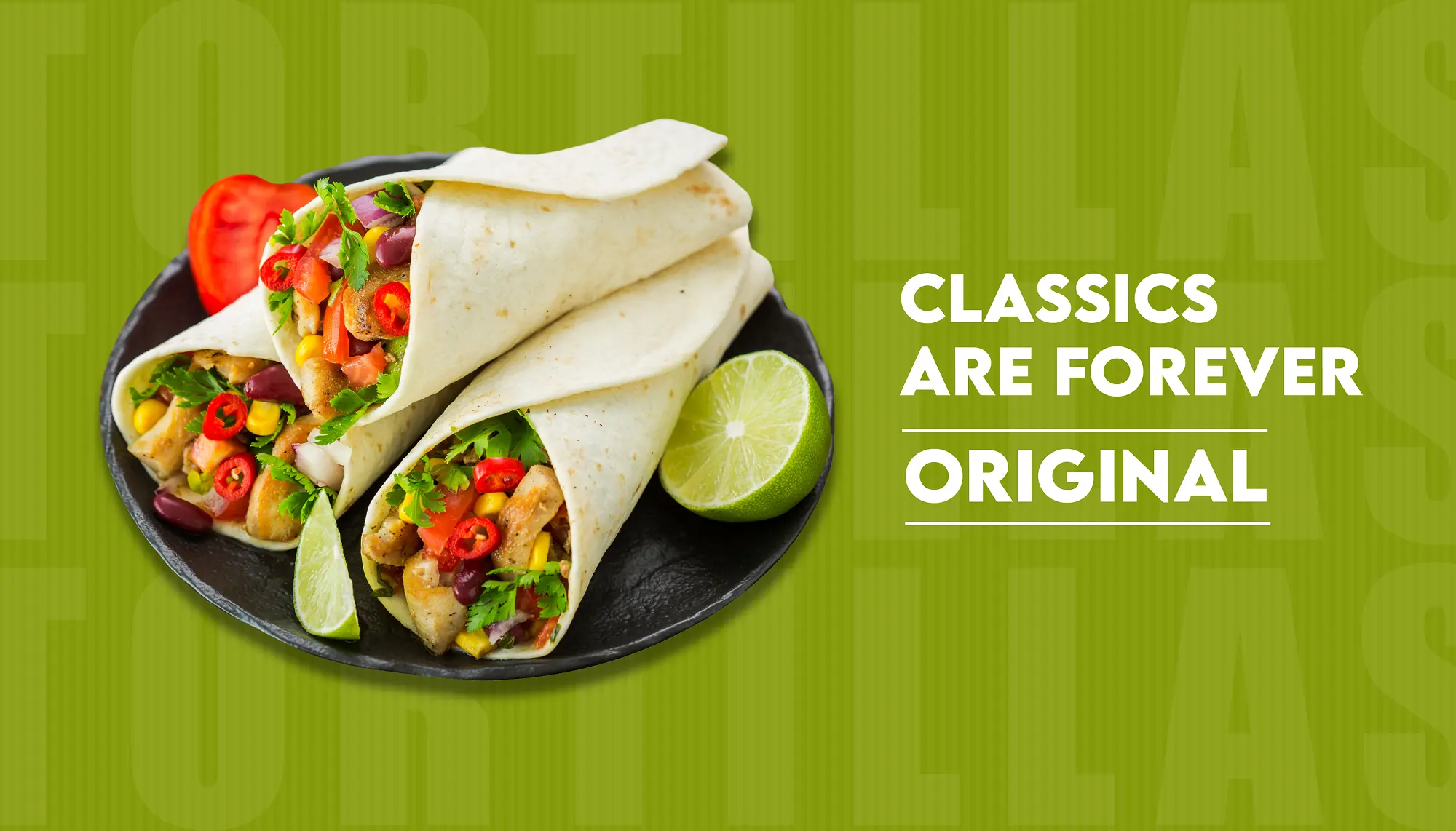 Three chicken and vegetable wraps served on a plate with lime wedges on a green background.