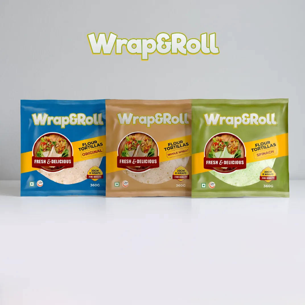 Three Wrap&Roll flour tortilla packs in original, whole wheat, and spinach flavors on a white background.