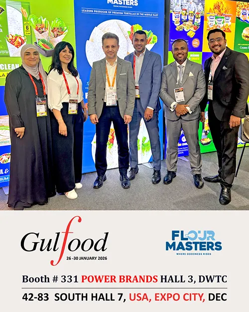 Five people standing in front of Flour Masters trade show display at Gulfood Expo booth 331 in Dubai, 2026.