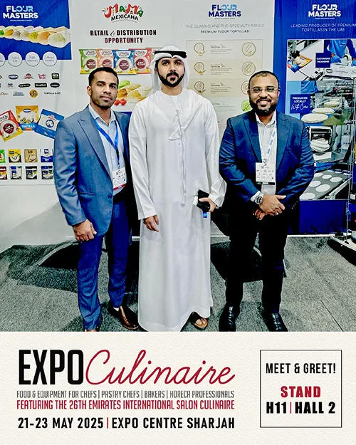 Three men posing at a trade show booth for flour masters and JaM Mexicana, promoting Expo Culinaire 2025 in Sharjah.