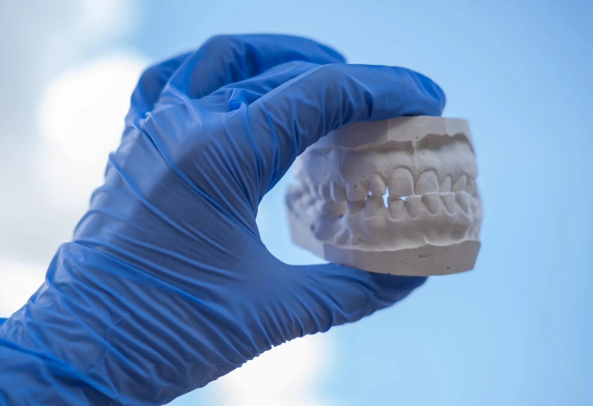 Patient smiling confidently with well-fitting, natural-looking dentures from Nova Dental Care of Chantilly