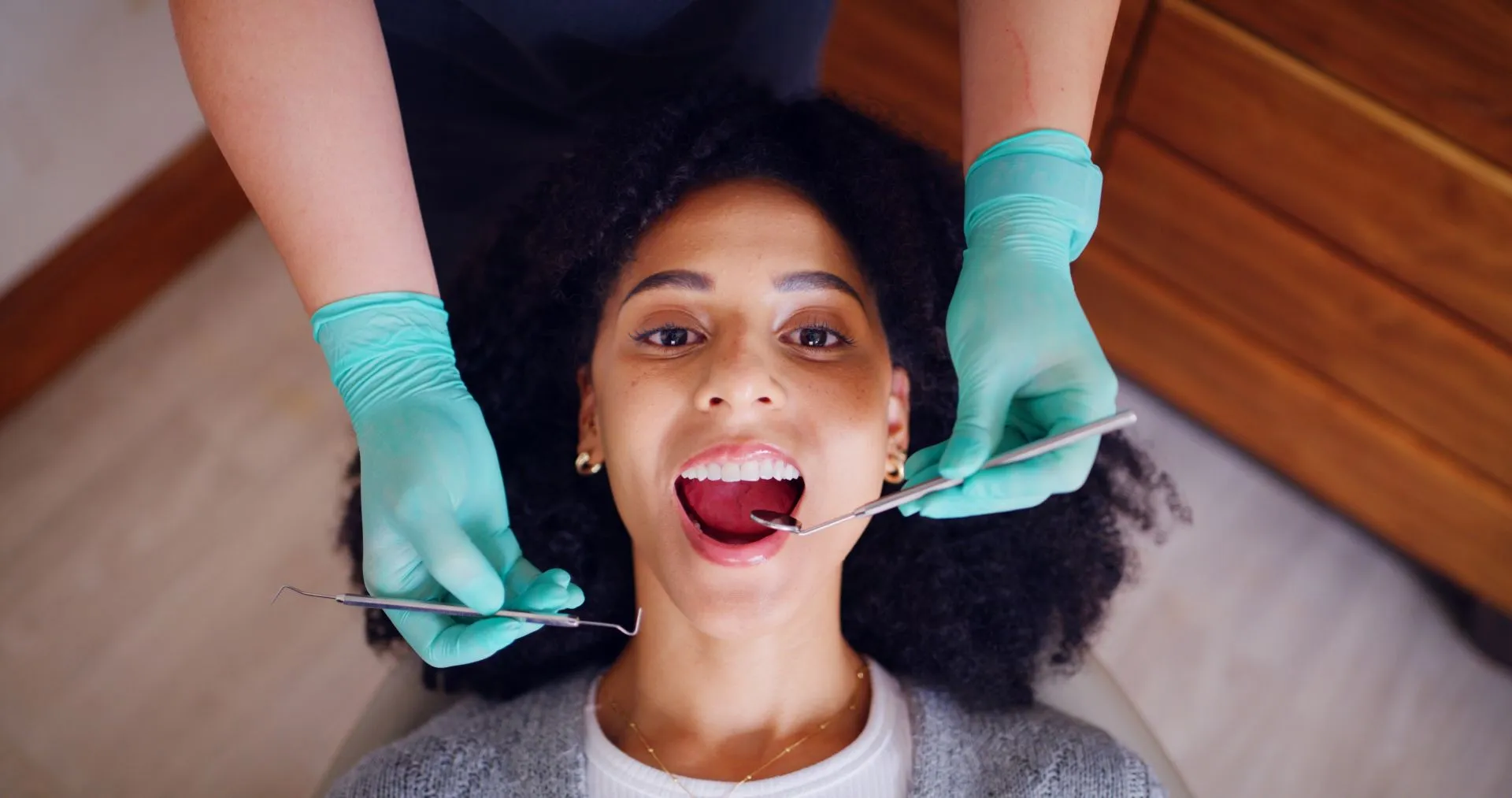 Patient smiling after a routine dental cleaning at Nova Dental Care of Chantilly