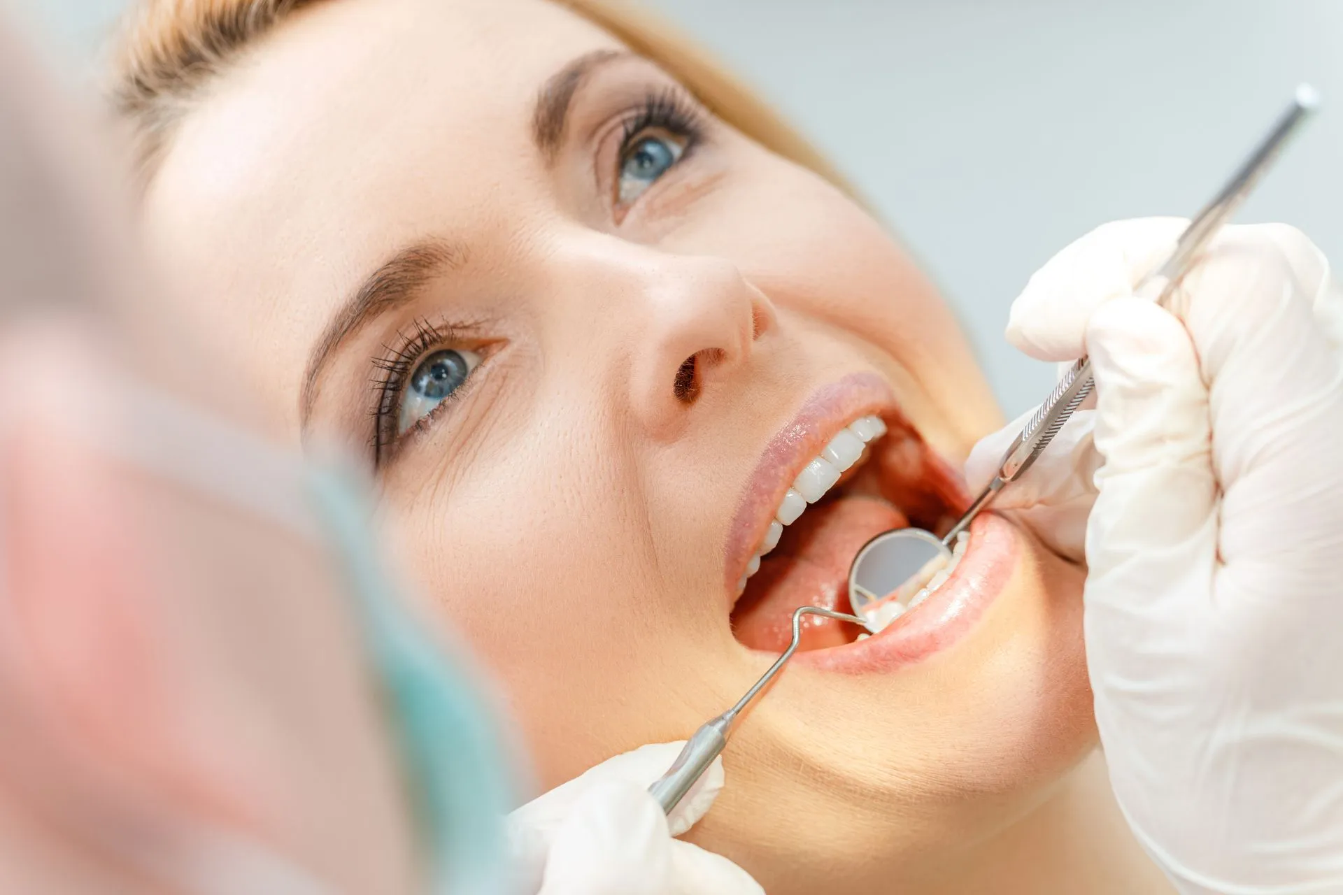 Dentist preparing for a sinus lift bone grafting procedure to support future dental implant placement