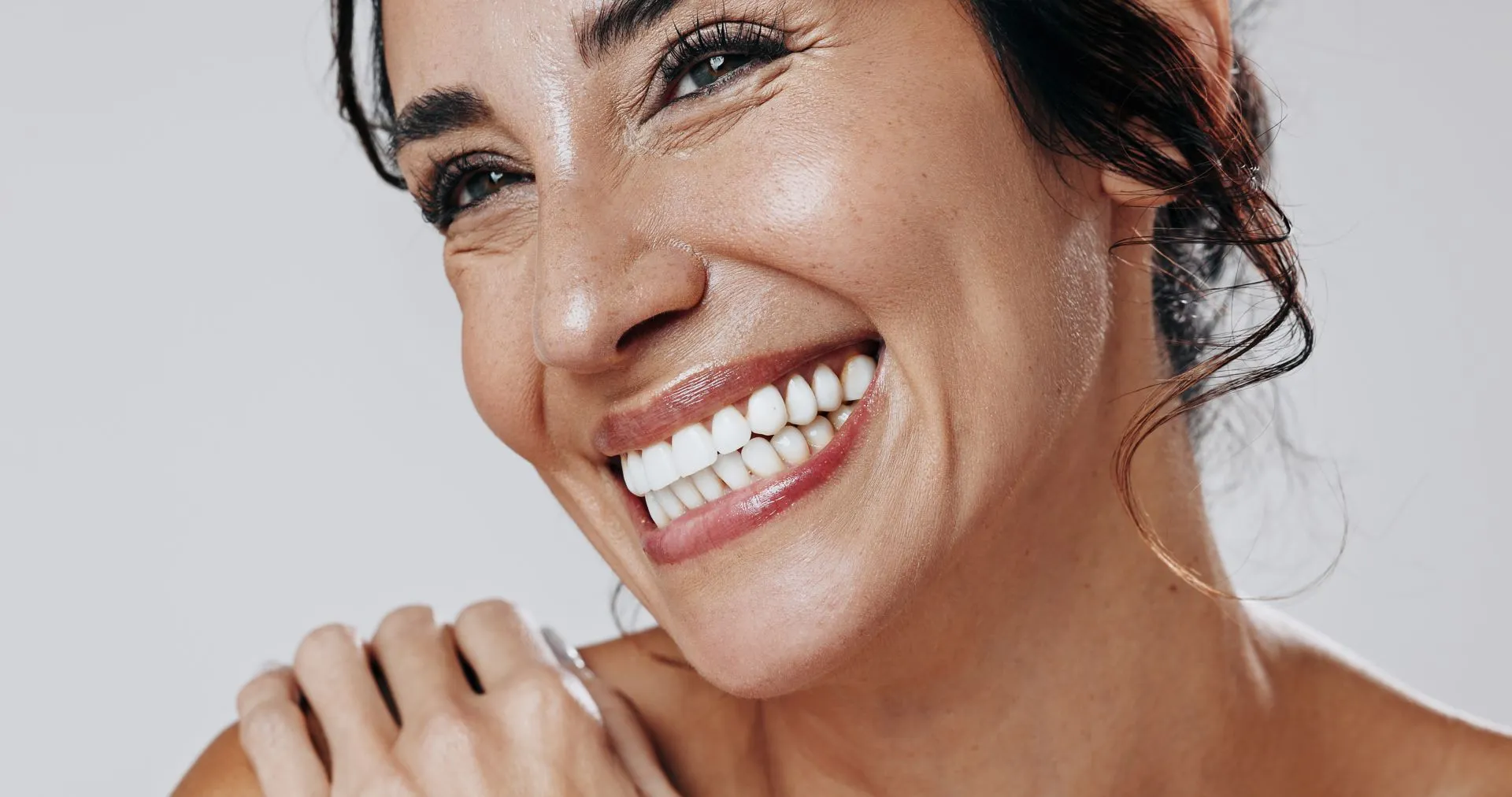 Close-up of a dental laser performing a precise soft tissue frenectomy procedure