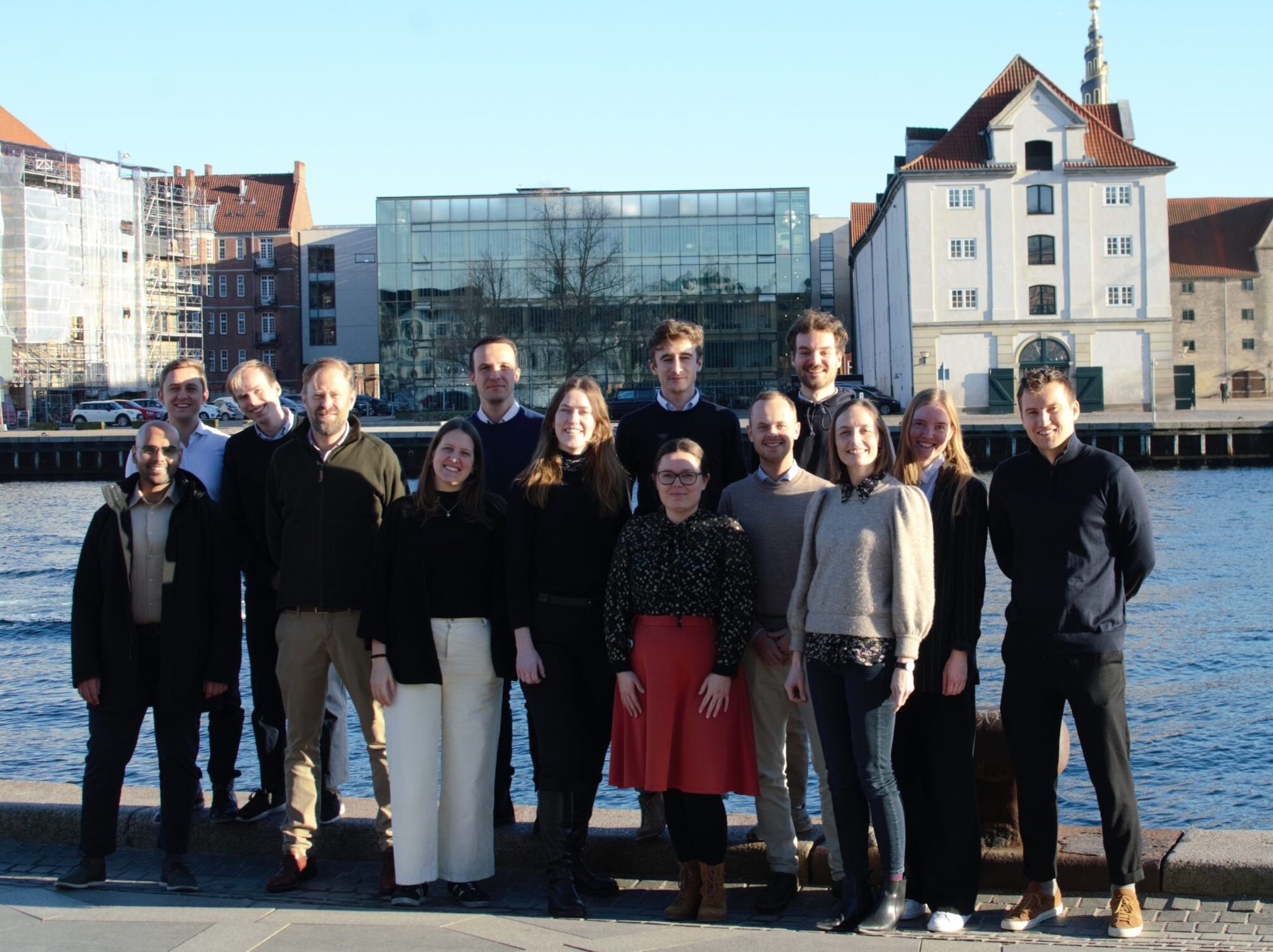 Part of the Aegir team enjoys the sun on the first day in Aegir Inisghts' new offices on the Copenhagen waterfront.