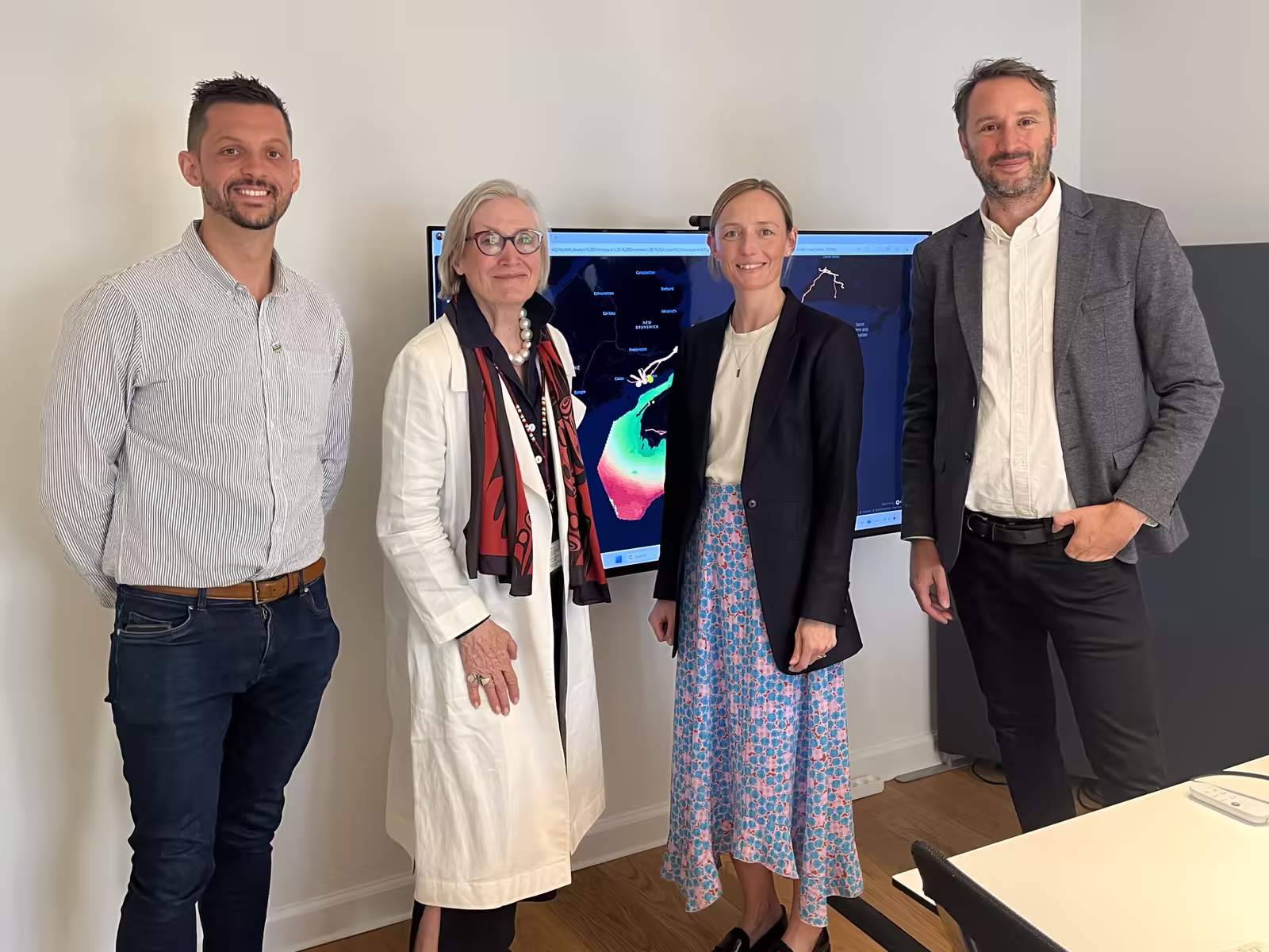 A picture of the Canadian Ambassador to Denmark, The Honourable Dr. Carolyn Bennett, and Richard Higginson from Invest Alberta visiting Aegir Insights' office with co-founders Rikke Nørgaard and Scott Urquhart.