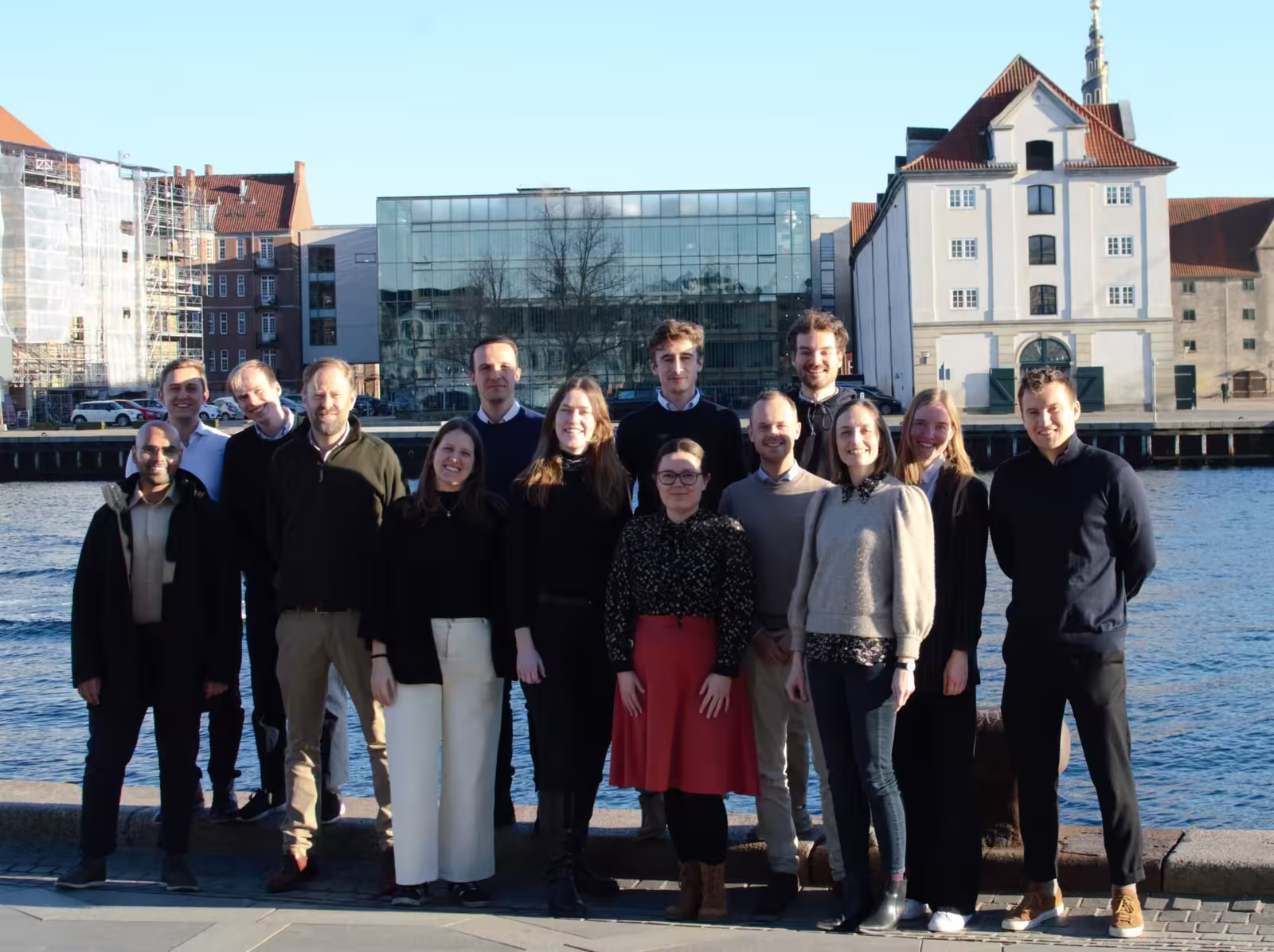 Part of the Aegir team enjoys the sun on the first day in Aegir Inisghts' new offices on the Copenhagen waterfront.