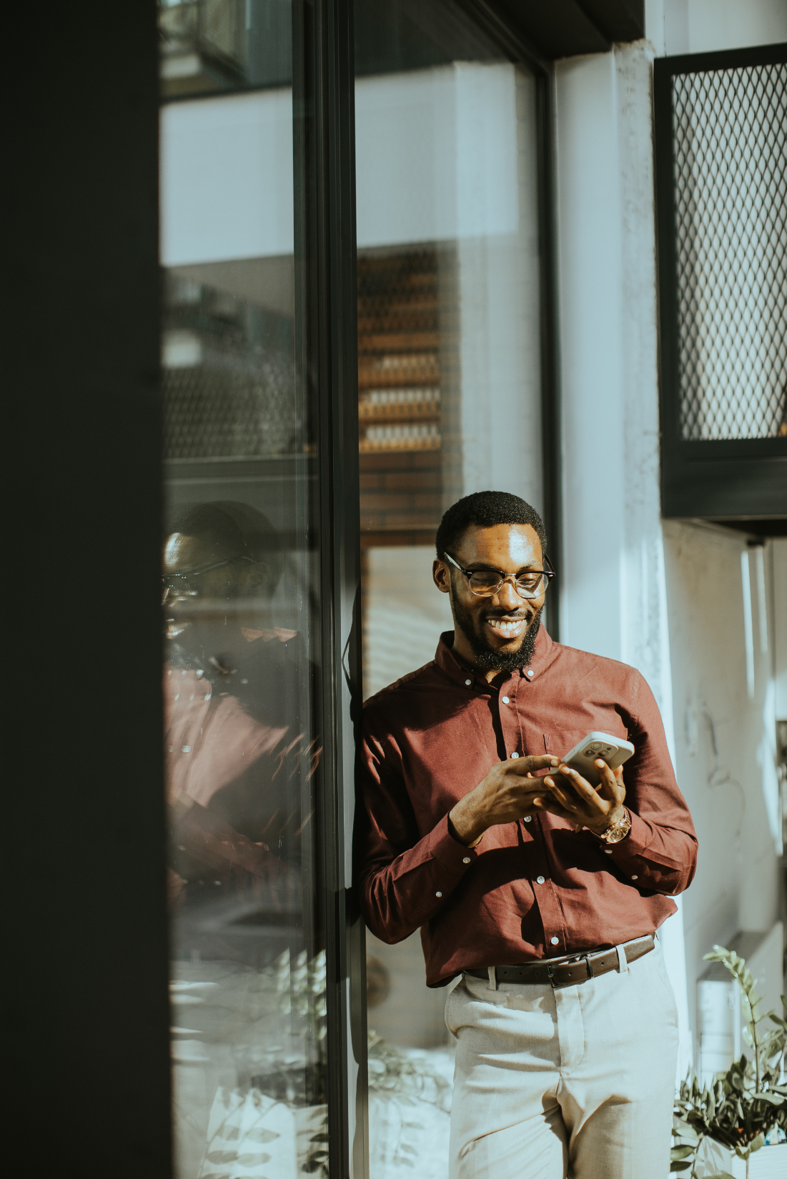 Man looking at phone stock image