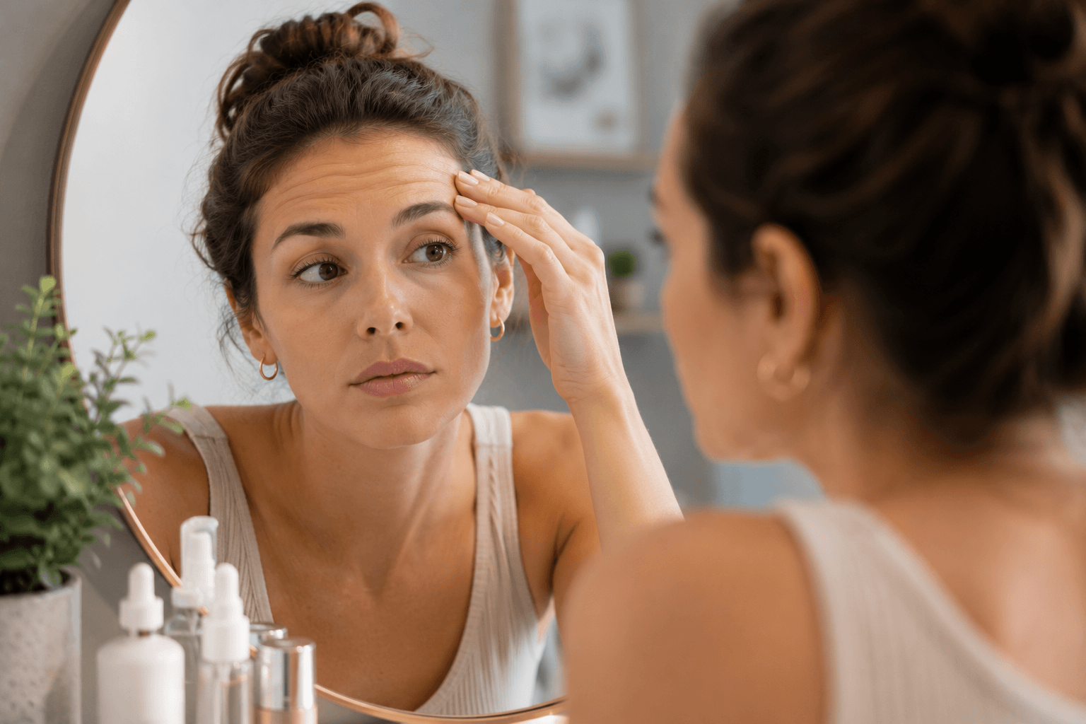 Provider administering Botox injection to a patient's forehead in Reston Virginia