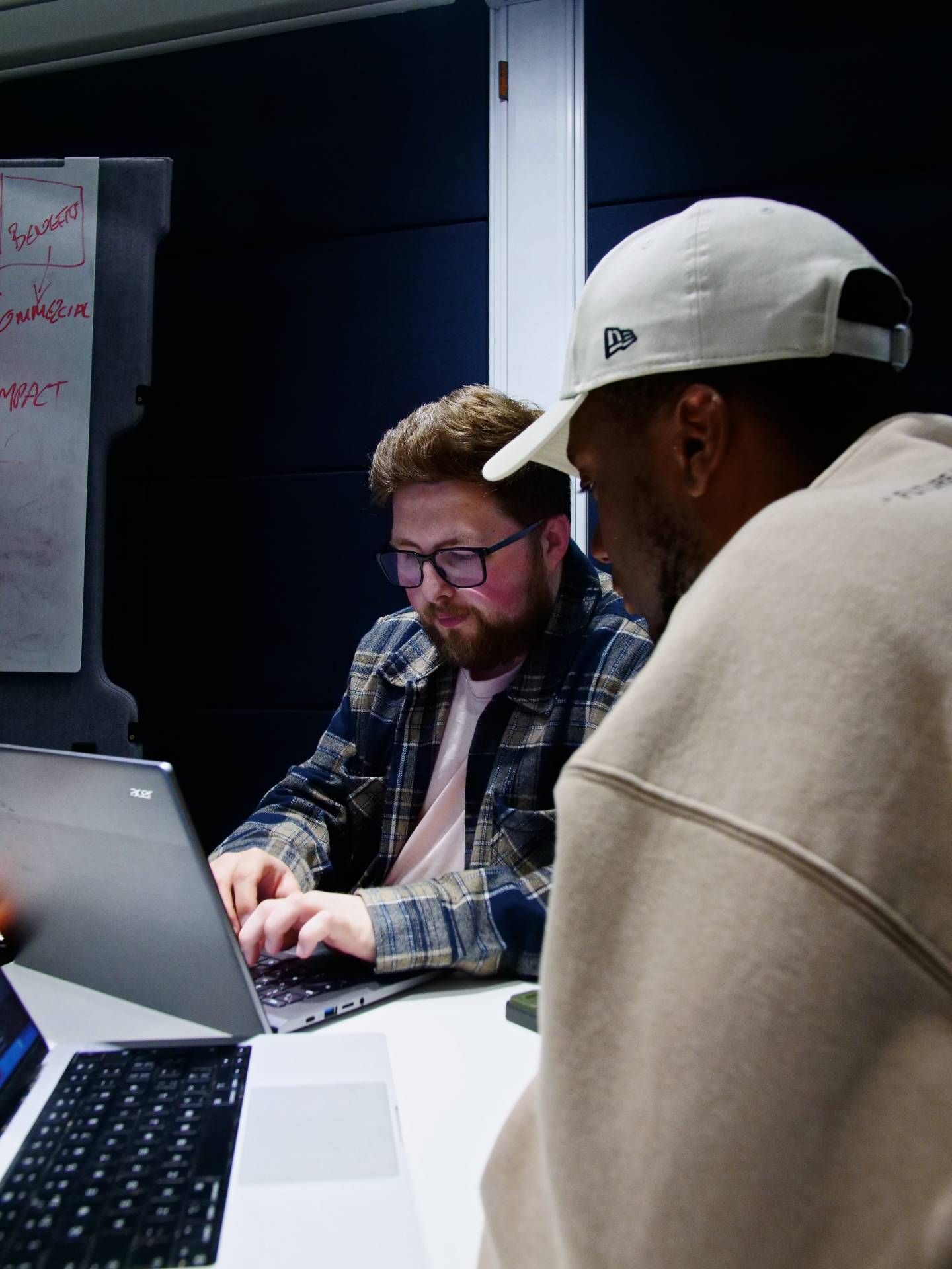 The Vault 5 team collaborating on digital strategy for charity partners, focusing on impact and results