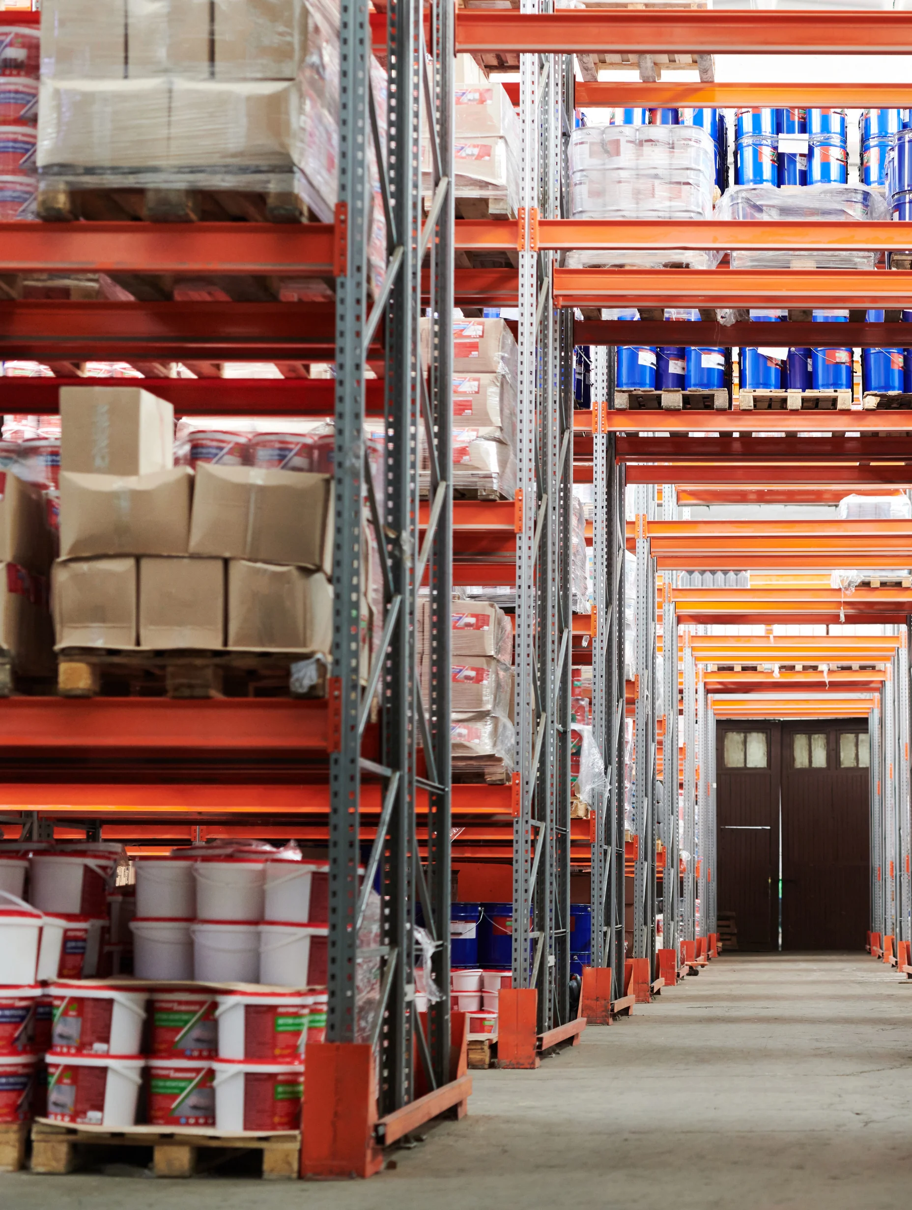 Inside of a distribution center, with shelves full of boxes