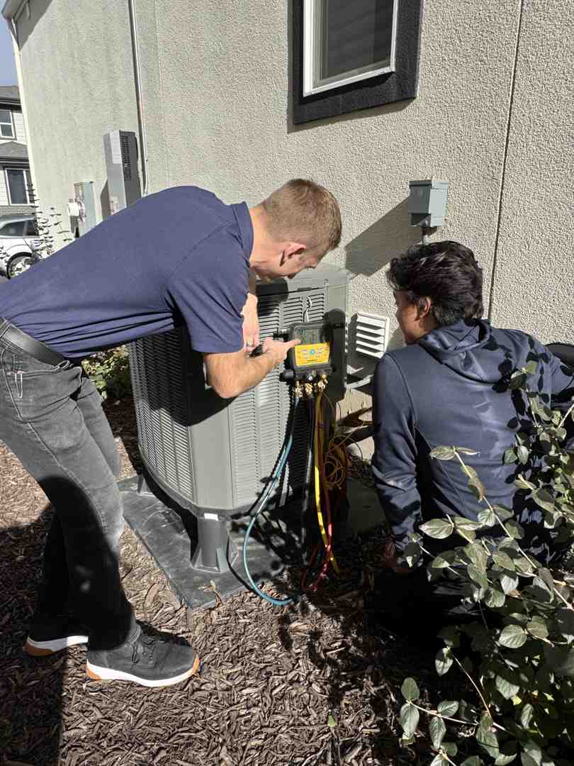 professional technician cleaning a boiler - home boiler cleaning