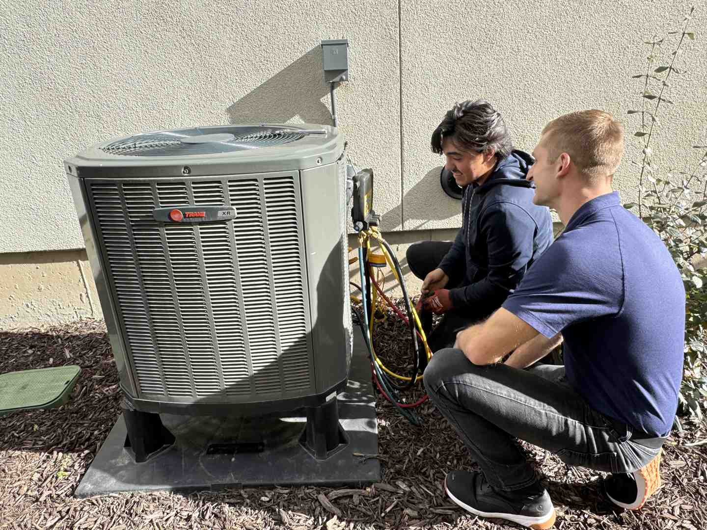 HVAC technician installing a system in Salt Lake City - HVAC Experts SLC