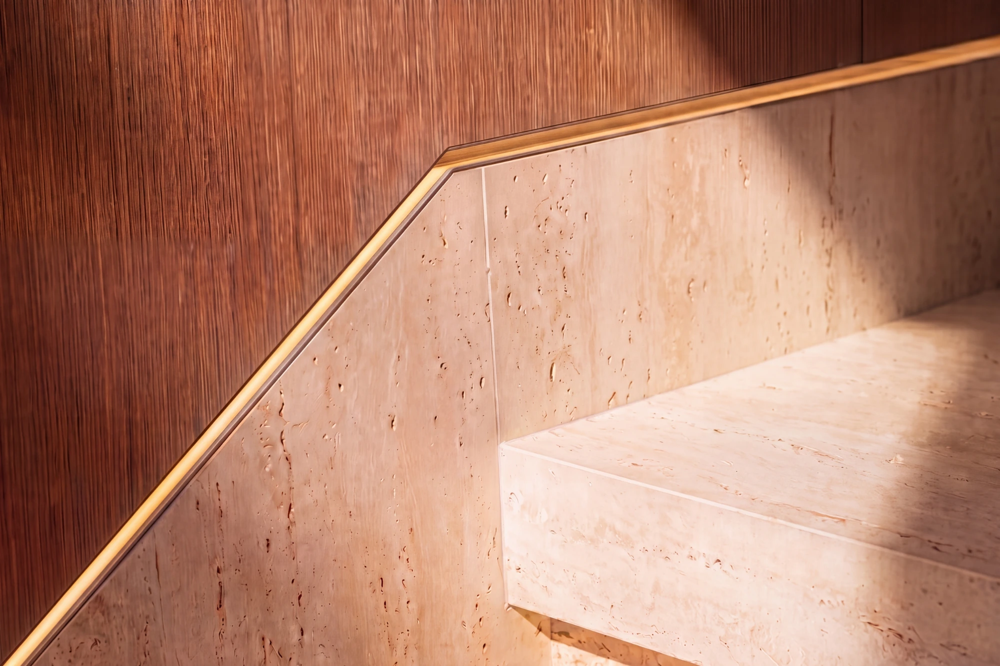 Close detail of a stone and joinery junction in a renovated Dubai villa