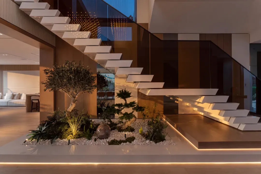 Sanctuary Falls — the cantilevered stair over the planted well