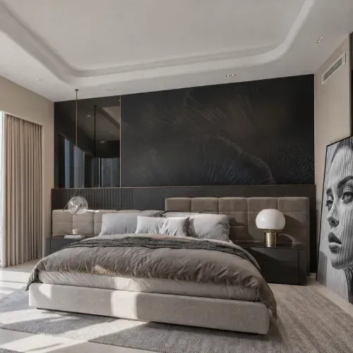 A principal bedroom with a textured dark headboard wall and upholstered panelling
