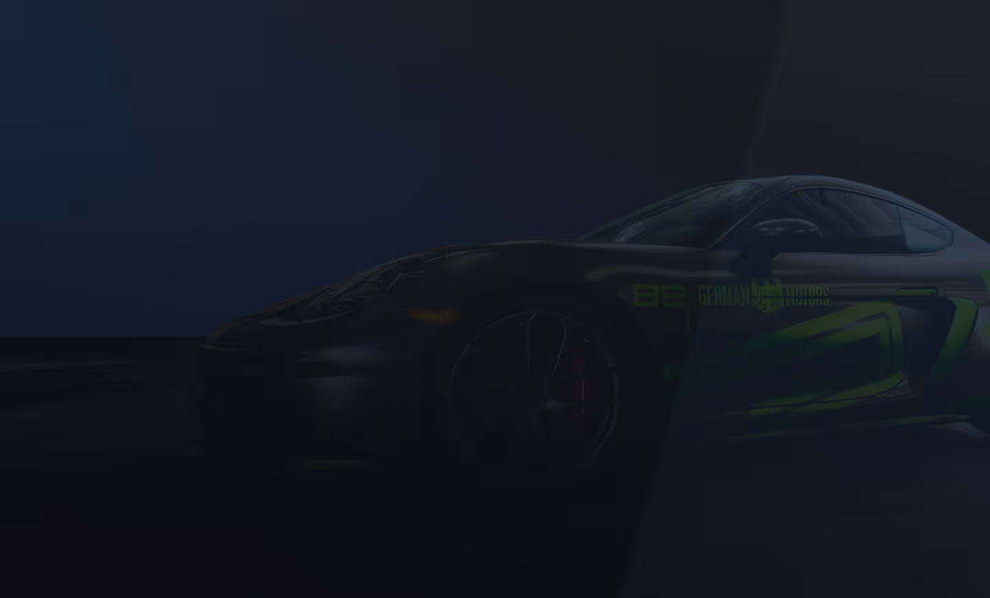 Matte black sports car with green racing stripes parked on a wet garage floor.