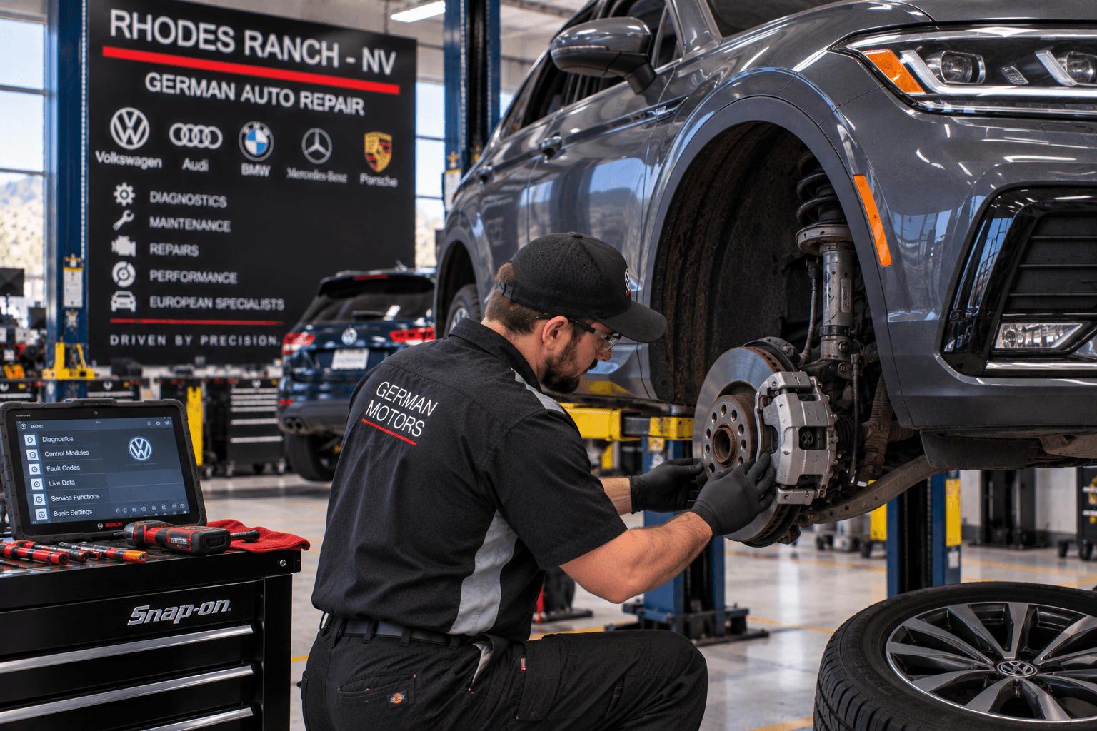 Volkswagen Repair in Rhodes Ranch - NV technician inspecting brake components beside a lifted SUV