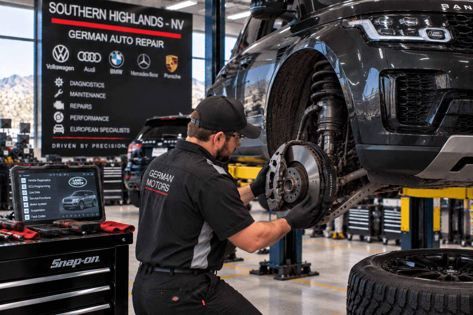 Land Rover Repair in Southern Highlands - NV technician checking brake and suspension components in shop