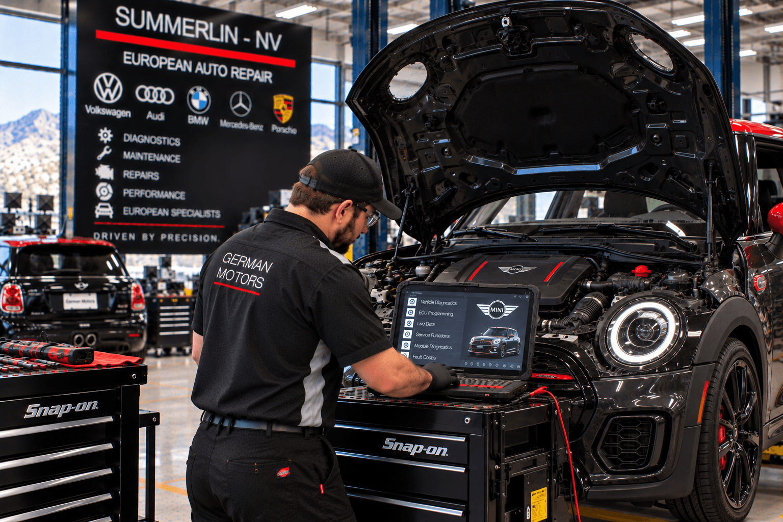 Technician performing Mini Cooper repair diagnostics in Summerlin - NV with scan tools and hood open