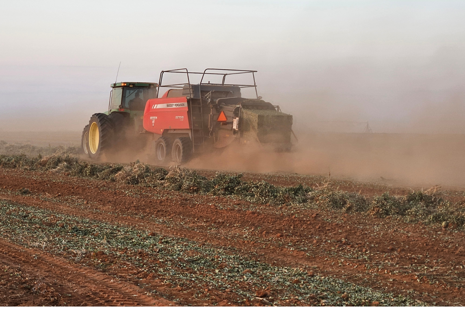 image of tractors in action for agricultural services