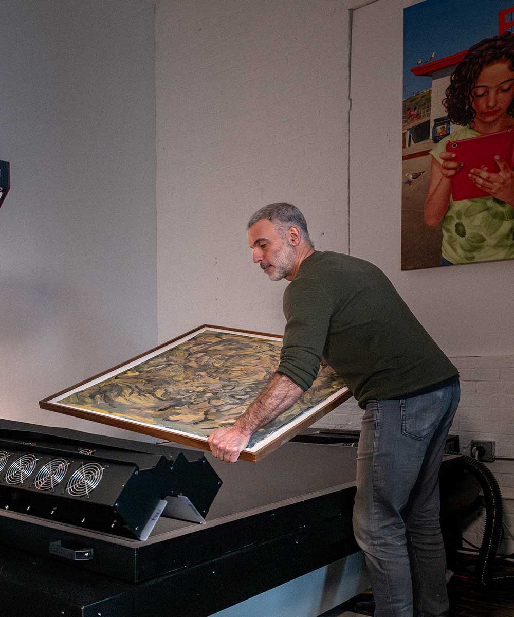 Large-format artwork on the scan bed during digitization
