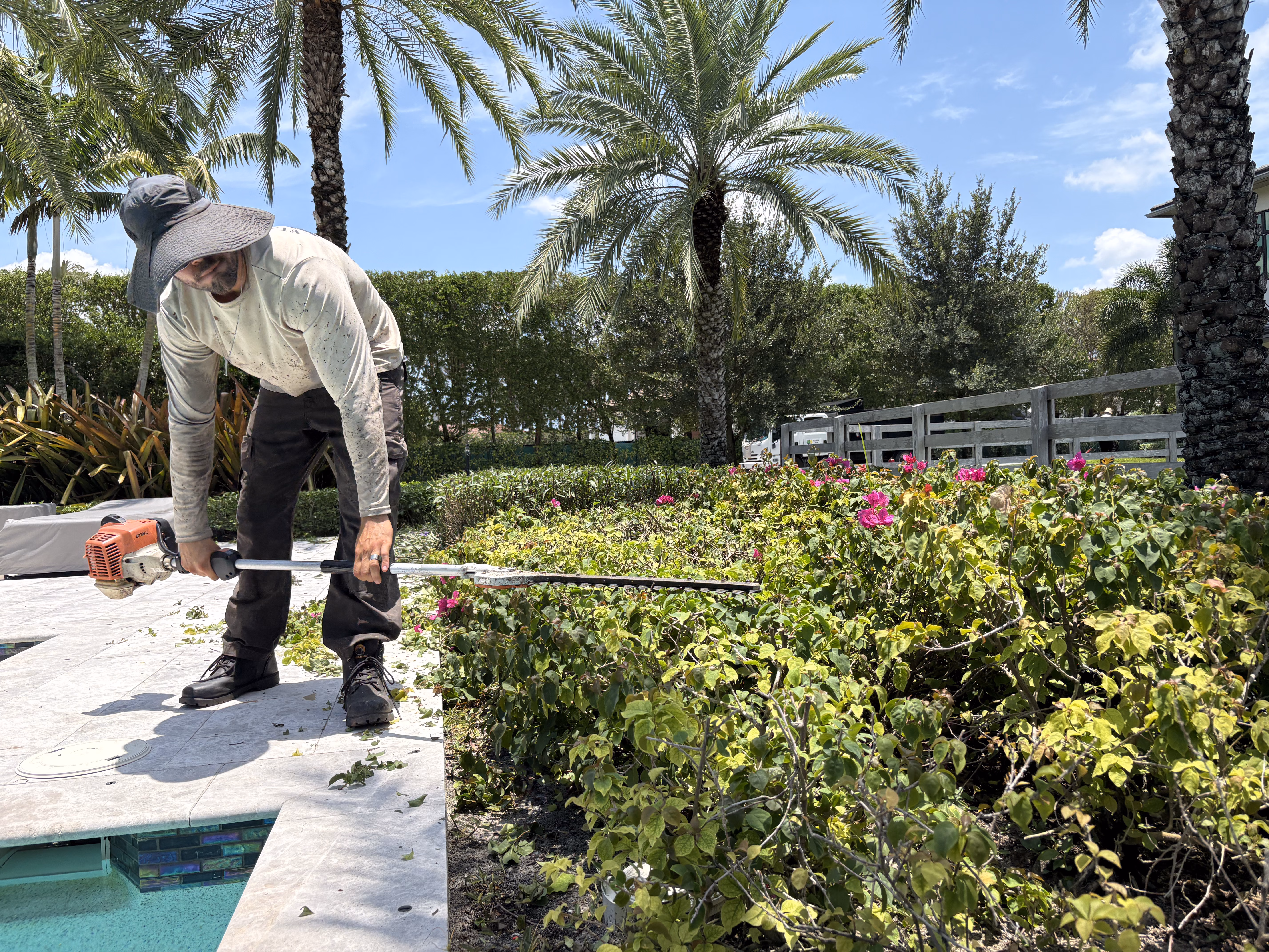 Florida Son Landscaping crew maintaining a Palm Beach County property