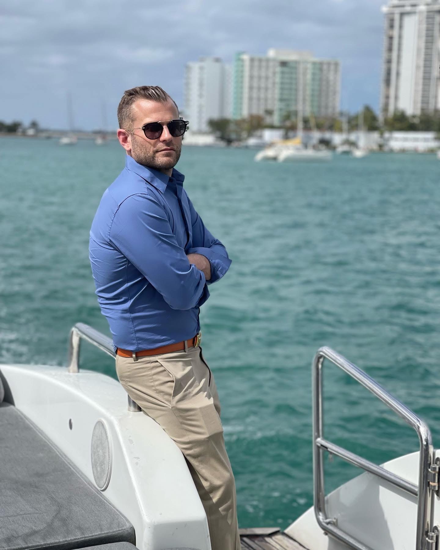 Justin Keeperman aboard a boat on the South Florida waterfront