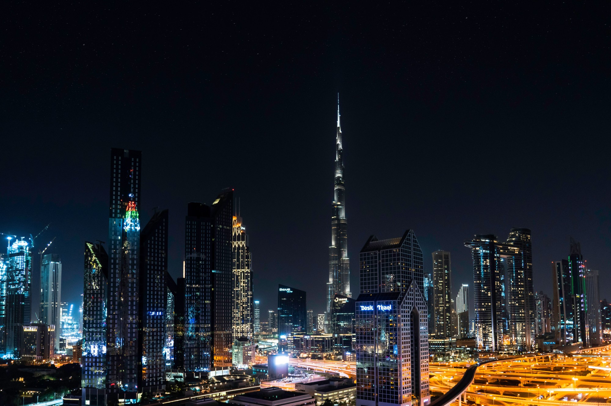 Dubai skyline and waterfront in warm evening light