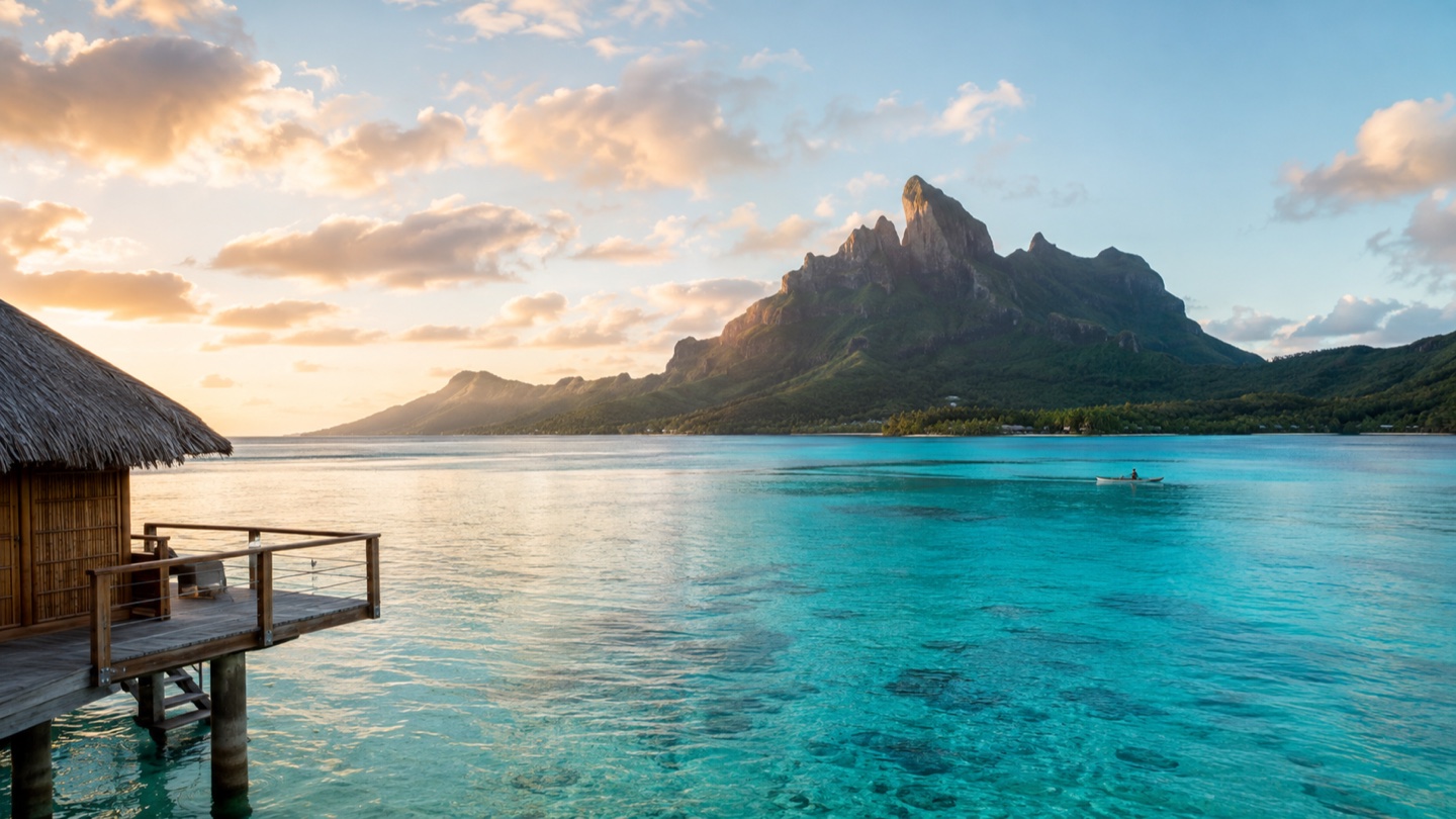 Mount Otemanu rising beyond Bora Bora's turquoise lagoon at sunrise