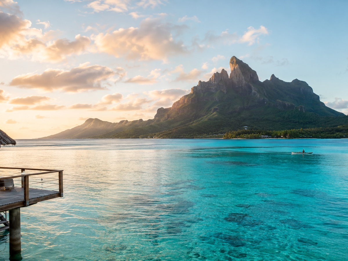 Mount Otemanu rising beyond Bora Bora's turquoise lagoon at sunrise