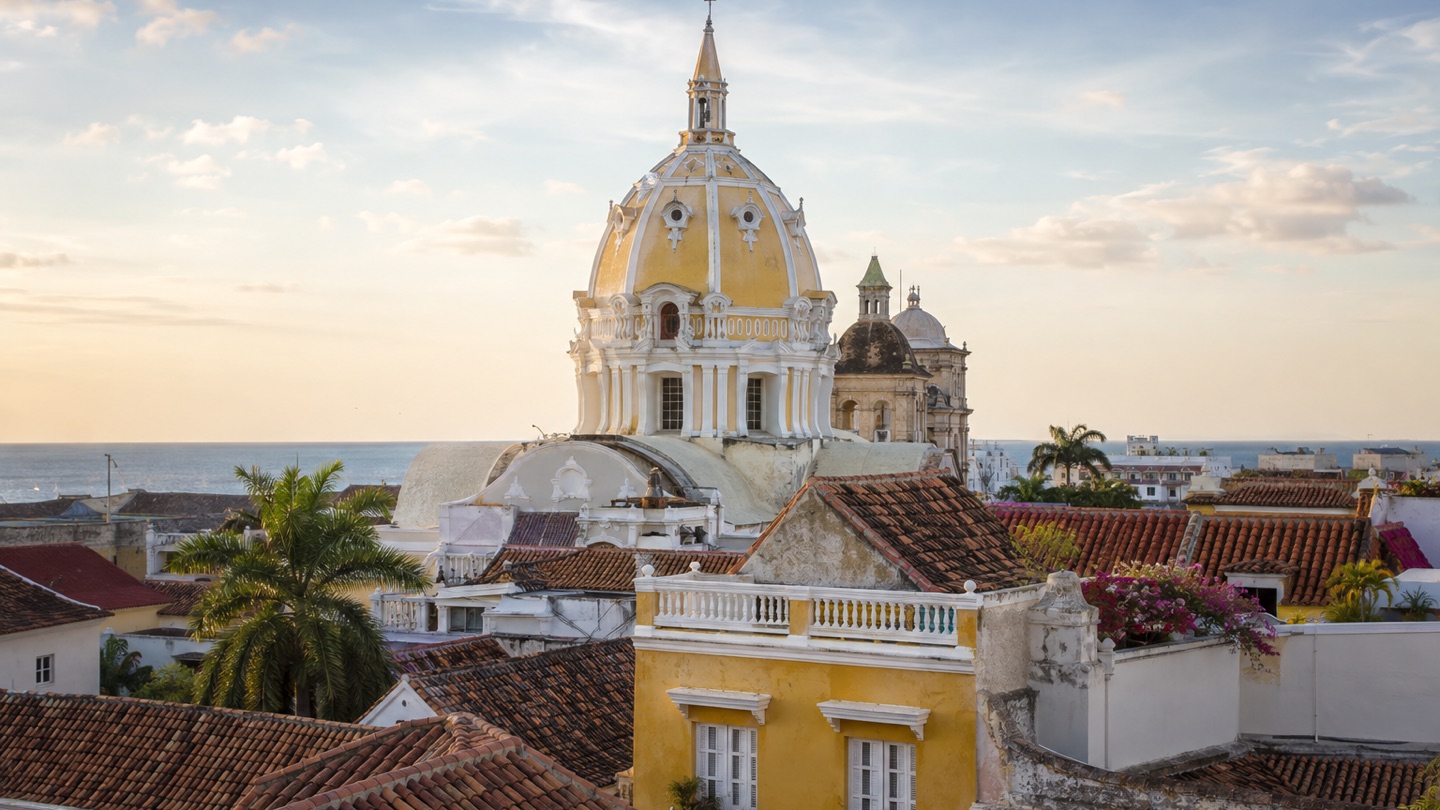 Colonial rooftops and the cathedral dome in Cartagena beside the Caribbean