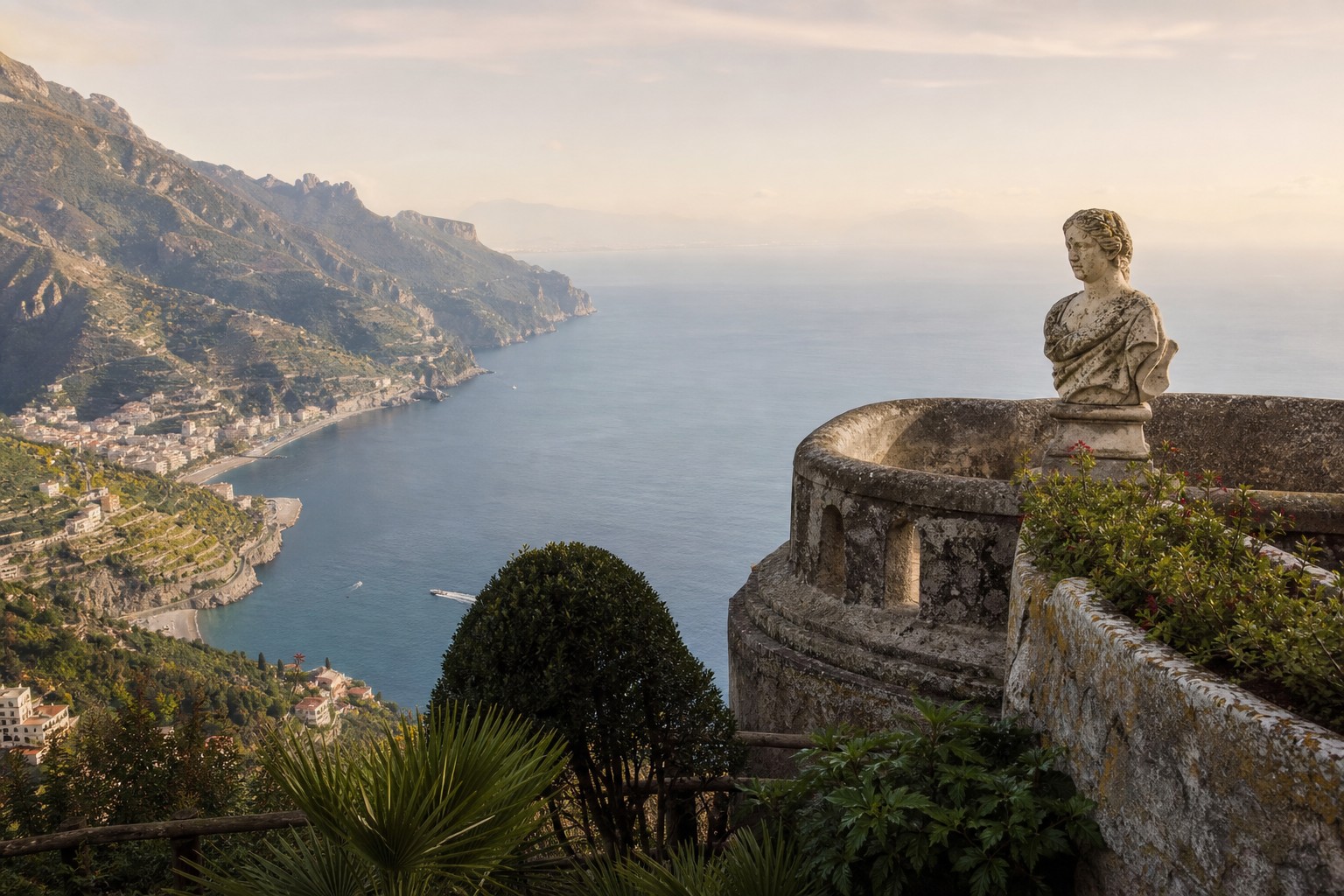 The terrace of a cliff garden in Ravello looking down the Amalfi coast to the sea