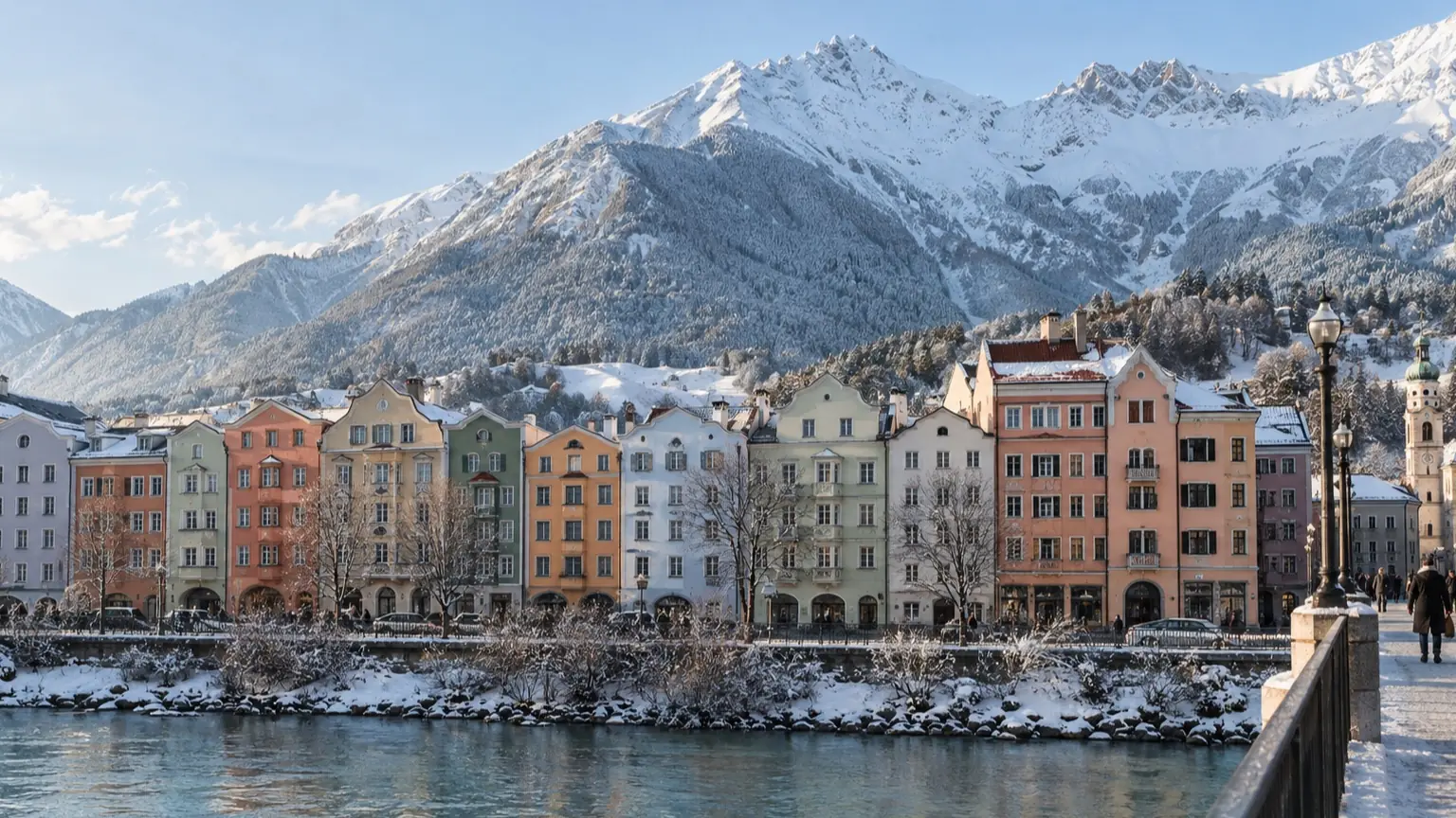 Innsbruck old town rooftops and Nordkette mountains in winter light