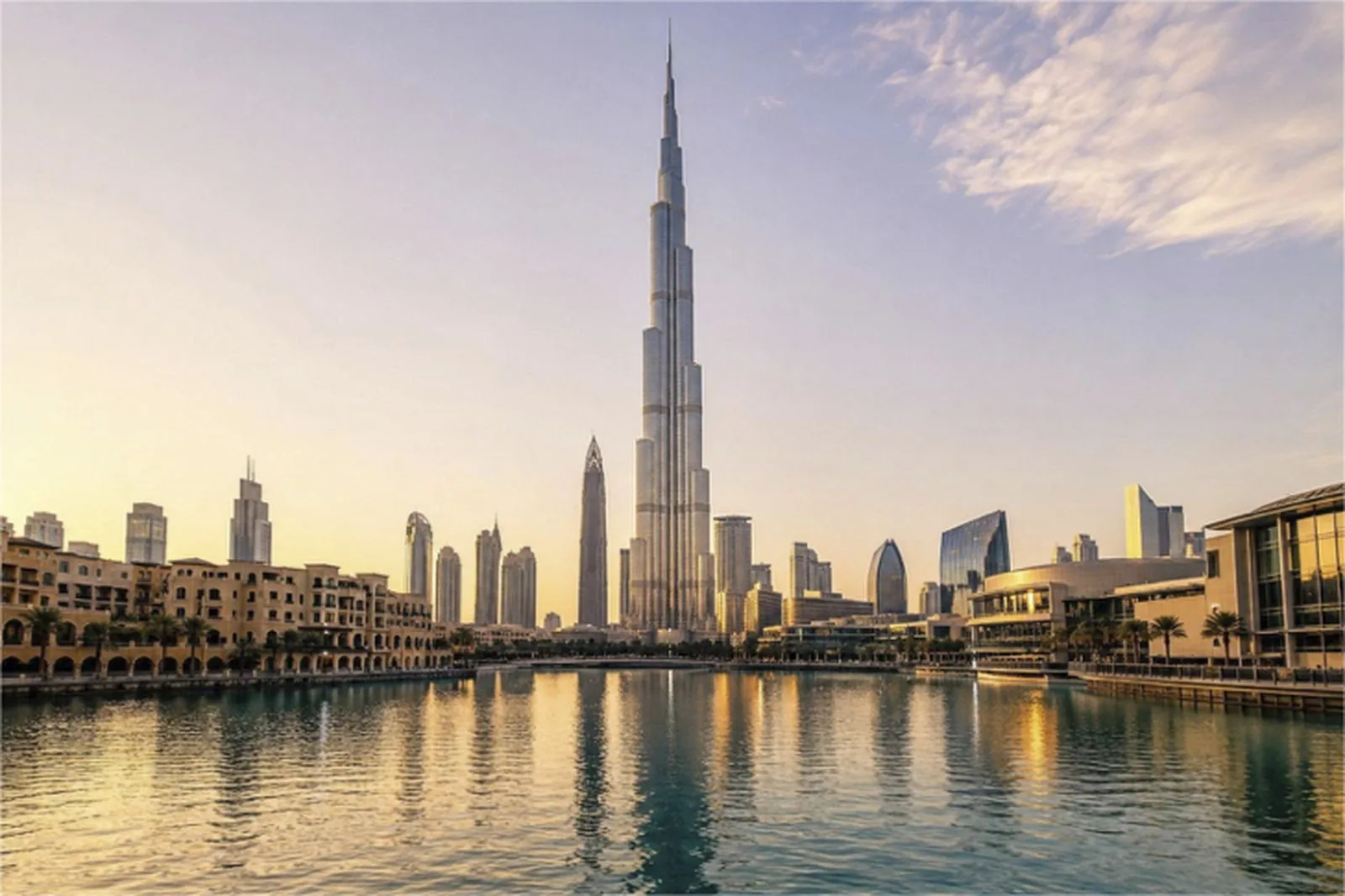 The Dubai skyline at dusk from across the water
