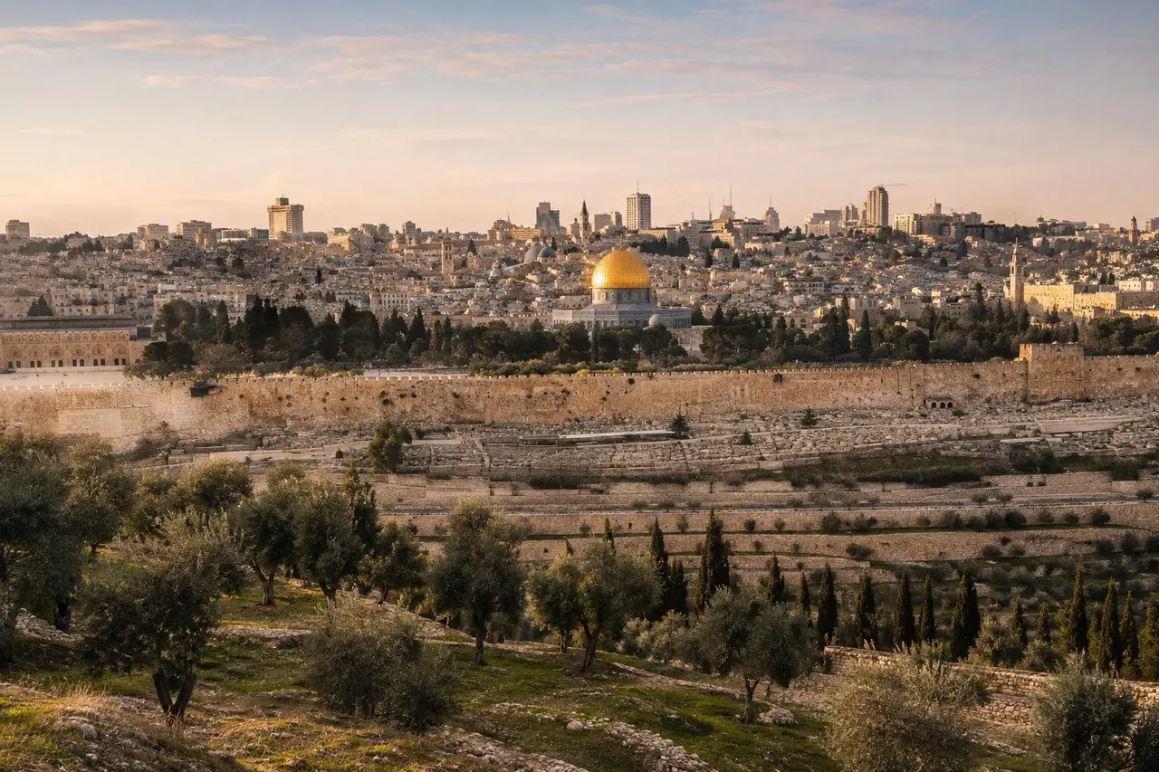 The Old City walls and the gold Dome of the Rock above olive groves in Jerusalem