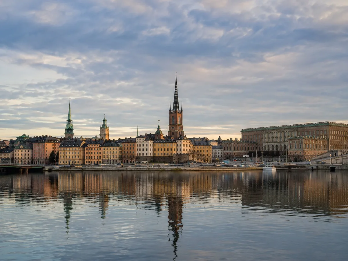 Stockholm old town skyline and waterfront reflected in calm evening water