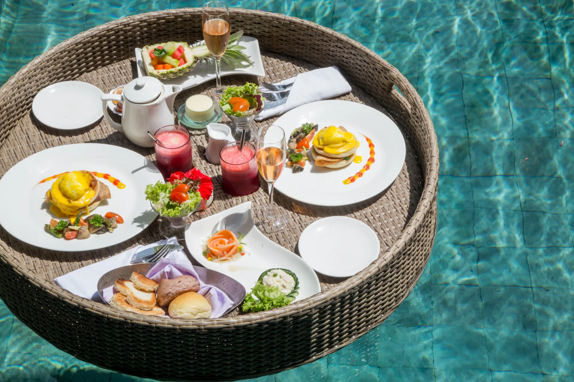 Floating breakfast for two in a resort pool