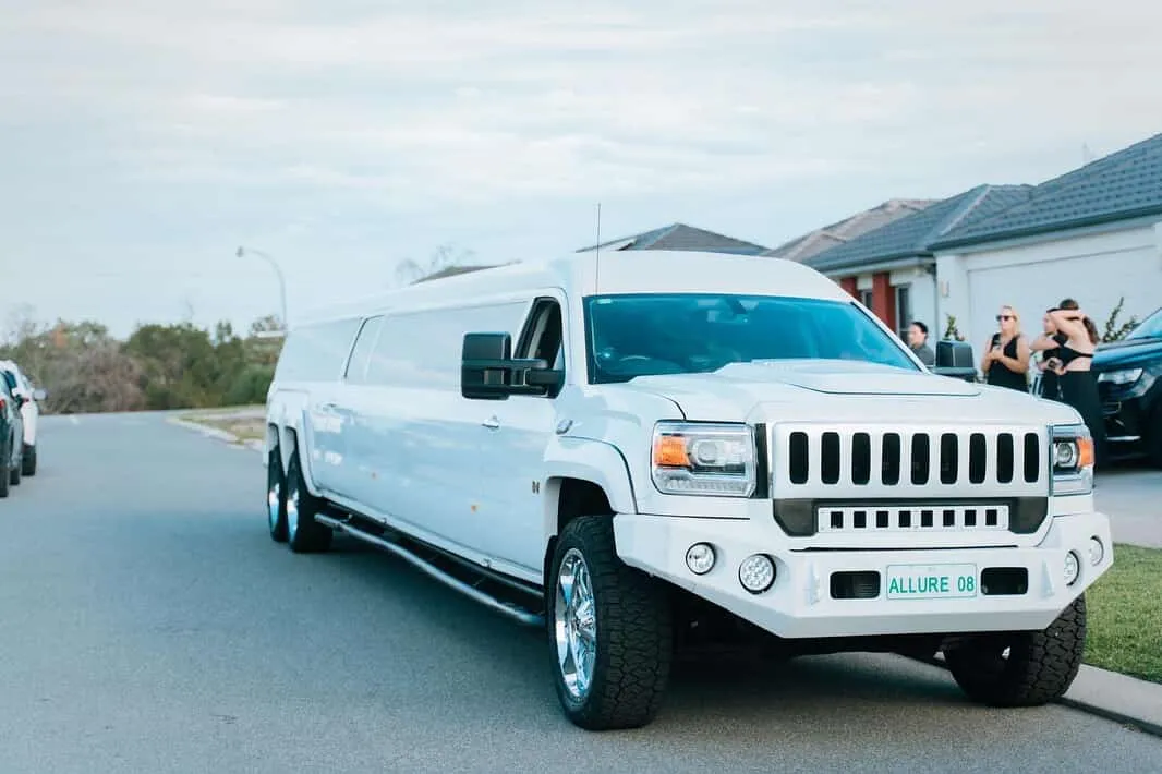 White stretch Hummer limousine side profile, Perth limo hire
