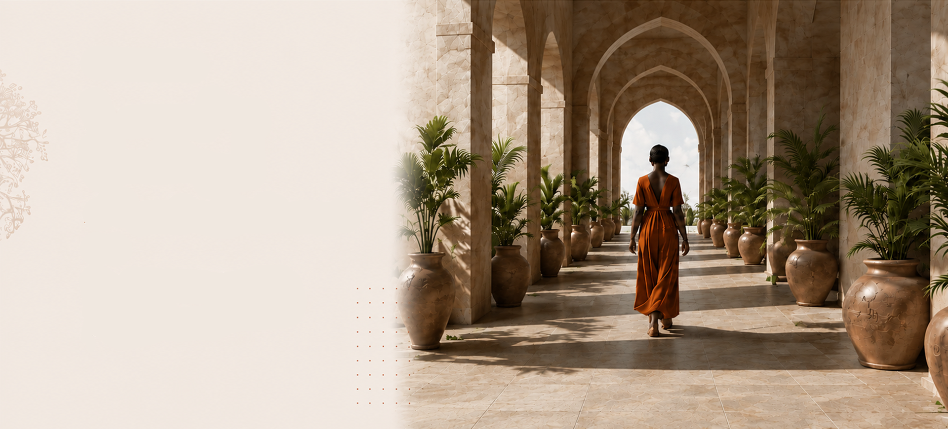 Woman in orange dress walking through sunlit stone archway lined with large potted plants.