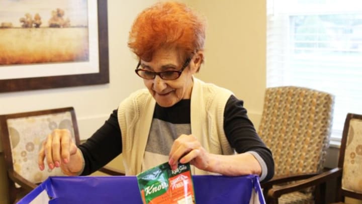 Grace Point Residents Put “Blessing Boxes” Together for Charity